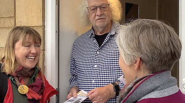 Sarah Gibson talking to residents on the doorstep